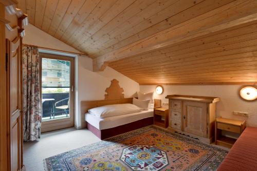 Ліжко або ліжка в номері Ferienwohnungen Kircher