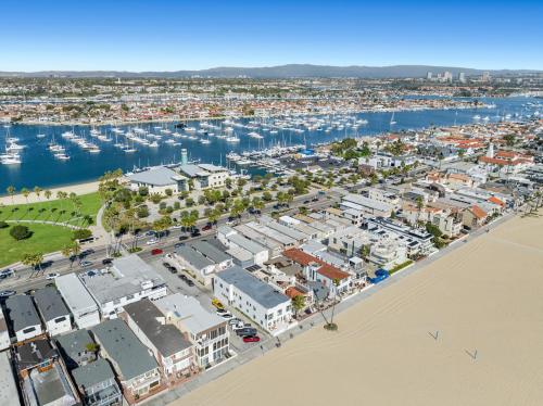 an aerial view of a harbor with a marina at 1628 West Oceanfront Oasis 9 in Newport Beach