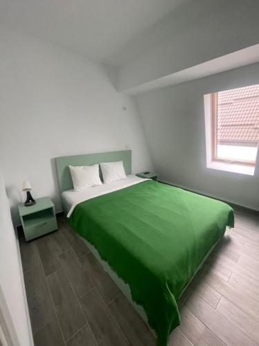 Ένα ή περισσότερα κρεβάτια σε δωμάτιο στο Marisah Residence #6