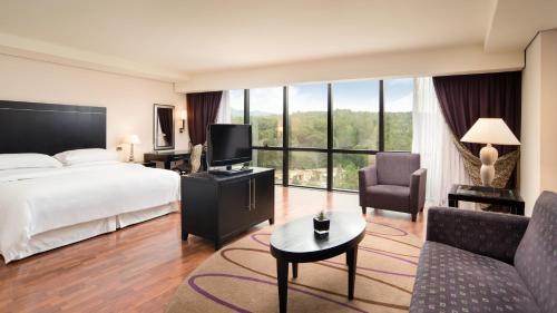 Postel nebo postele na pokoji v ubytování Mak Albania Hotel