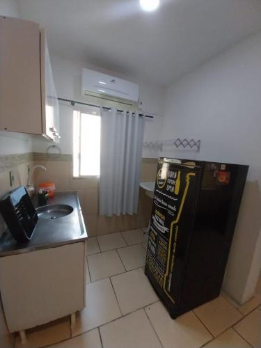 Dapur atau dapur kecil di JK POUSADA FLAT ECONOMICO com garagem CENTRAL