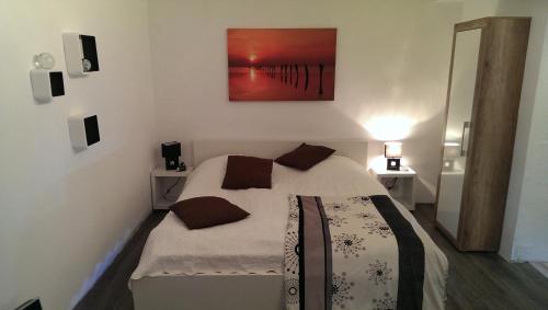 Ένα ή περισσότερα κρεβάτια σε δωμάτιο στο Messe und Ferienwohnung