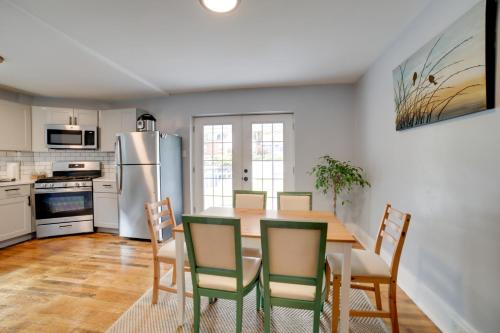a kitchen and dining room with a table and chairs at Pittsburgh Home Near Frick Park, 7 Mi to Dtwn in Pittsburgh