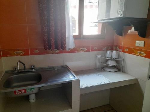 Kuchyň nebo kuchyňský kout v ubytování Hotel Posada Del Parque