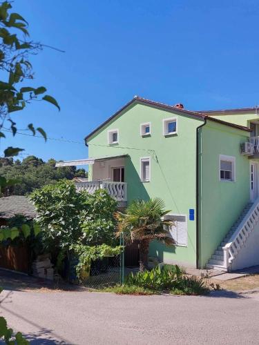 Apartments with a parking space Palit, Rab - 23237