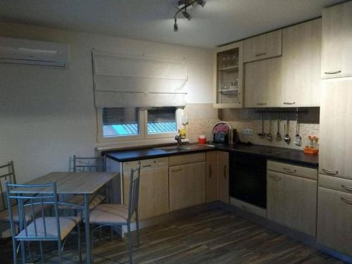 Apartments with parking space Palit, Rab - 23237