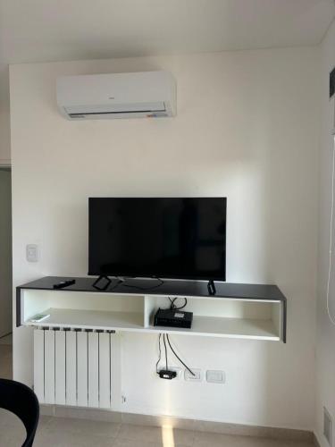 TV a/nebo společenská místnost v ubytování Suite Centro Junin
