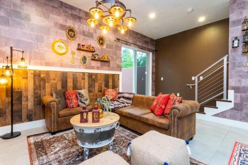a living room with a couch and a table at Magical Wizards Castle in Orlando