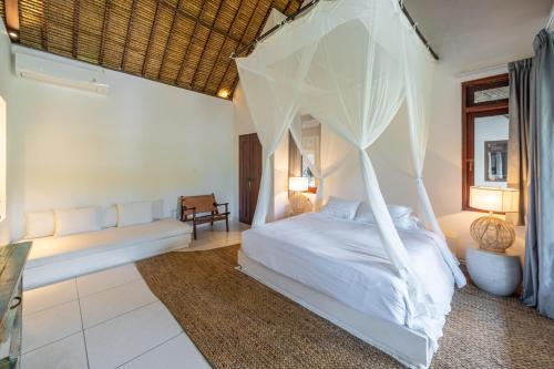 Ένα ή περισσότερα κρεβάτια σε δωμάτιο στο VillaJewel Bali