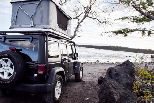a jeep with a camper on top of it at CampCar Maui Jeeps SUVs Hybrid Camper van Rentals with equipment and Travel Advice in Kahului