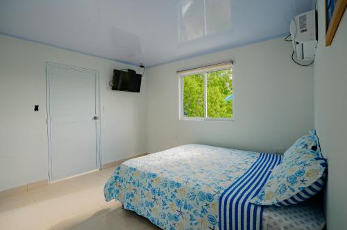 Postel nebo postele na pokoji v ubytování Shamar Lodge