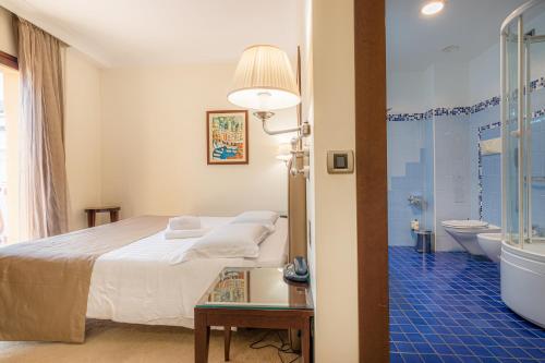 Kúpeľňa v ubytovaní Hotel Cala Del Porto