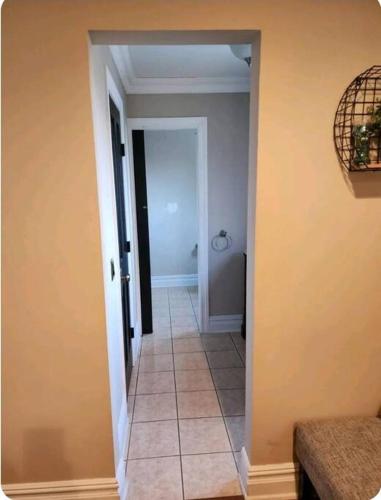 a hallway with a hallway leading to a room at Beautiful home with mountain top views with an EV and NEMA connection!! in Poughkeepsie
