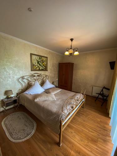 Postel nebo postele na pokoji v ubytování Pyate Koleso