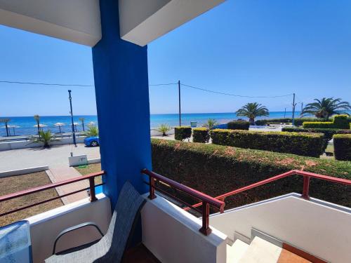 a balcony with a view of the beach at Sozopoli Seaview in Sozopoli