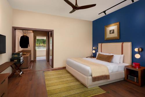 Postel nebo postele na pokoji v ubytování Modi Estate, Meerut - AM Hotel Kollection