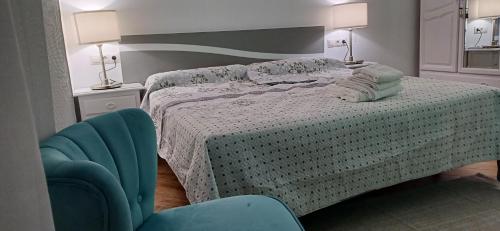 Katil atau katil-katil dalam bilik di Ático 2 dormitorios y apartamento 2 dormitorios