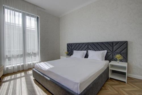 Postel nebo postele na pokoji v ubytování NOVEL hotel and Apartments