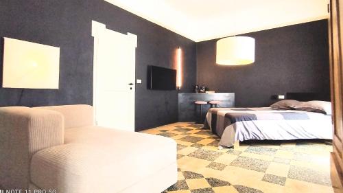 Postel nebo postele na pokoji v ubytování Matilde Rooms
