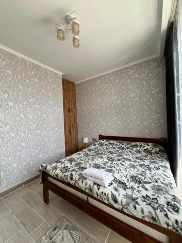 a bedroom with a bed in a room at Palm beach 10 in Chok-Tal