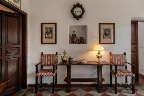 Un lugar para sentarse en Villa Margherita with private pool