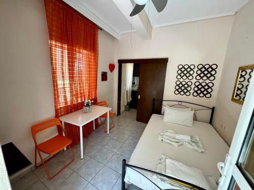 Postel nebo postele na pokoji v ubytování Seaside Apartments & Rooms Kampouri