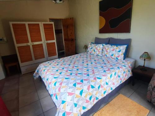 Ένα ή περισσότερα κρεβάτια σε δωμάτιο στο Erin Farmhouse & Cottages