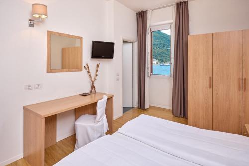 Postel nebo postele na pokoji v ubytování Hotel Geier