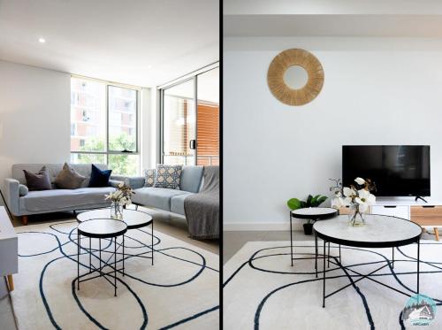 a living room with a couch and a table at Aircabin - Mascot - Comfy - Family-2 Beds Apt in Sydney