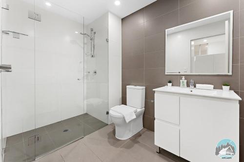 Ένα μπάνιο στο Aircabin - Mascot - Comfy - Family-2 Beds Apt