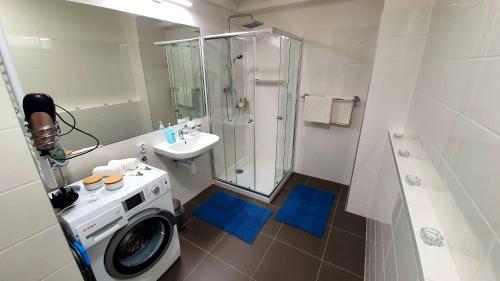 Et badeværelse på LUXURY APARTMENT VBLOKU