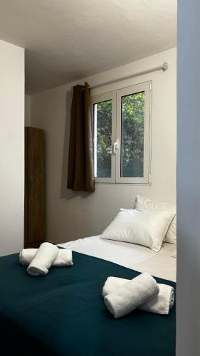 Katil atau katil-katil dalam bilik di Stella's Olive Tree House