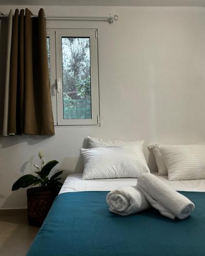 Katil atau katil-katil dalam bilik di Stella's Olive Tree House