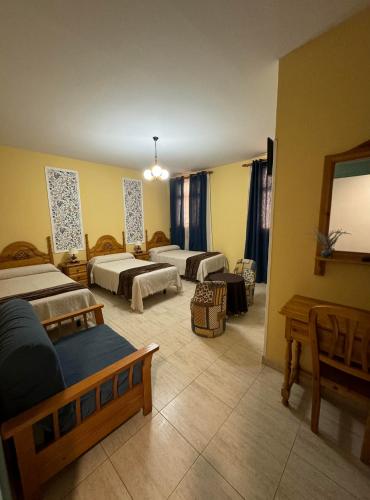 Katil atau katil-katil dalam bilik di Hostal Joaquín