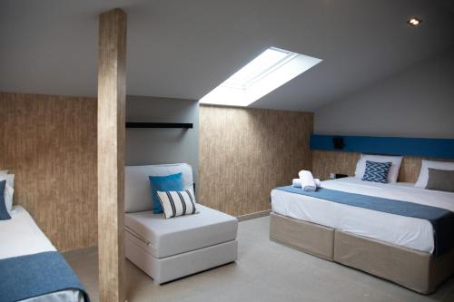 Katil atau katil-katil dalam bilik di Mythic Summer Hotel