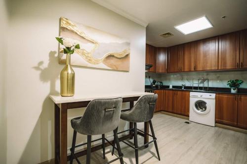 Kuchyň nebo kuchyňský kout v ubytování Luxurios One Bedroom High Floor