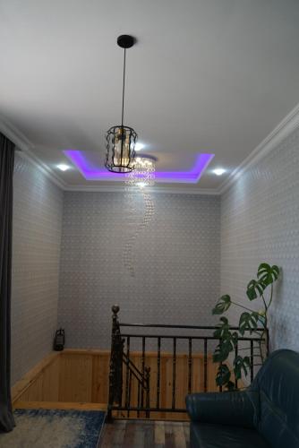 a room with a ceiling with a purple light at Panorama in KUTAISI in Kutaisi