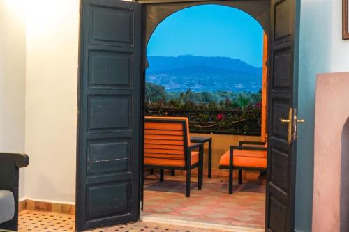 an open door leading to a room with a view at Villa Tifira in Marrakech