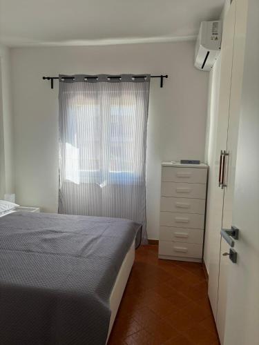 Ένα ή περισσότερα κρεβάτια σε δωμάτιο στο La casetta di Dany