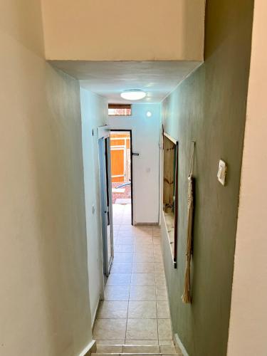 a hallway with a hallway leading into a room at Melambai in Eilat