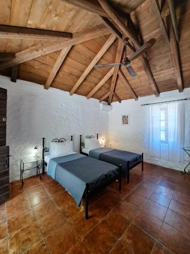 Ένα ή περισσότερα κρεβάτια σε δωμάτιο στο Tsivouli Accommodation