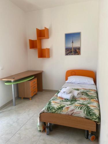 Postel nebo postele na pokoji v ubytování Vista Panoramica SGJ