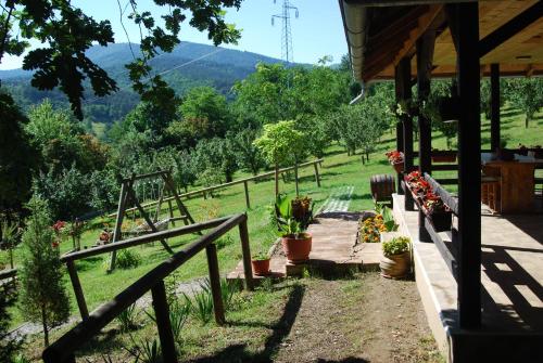a view from the porch of a farm house with mountains in the background at Brvnare Dunja 1 i Dunja 2 in Kraljevo