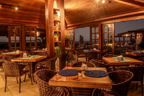 Manacá Pousada Parqueにあるレストランまたは飲食店