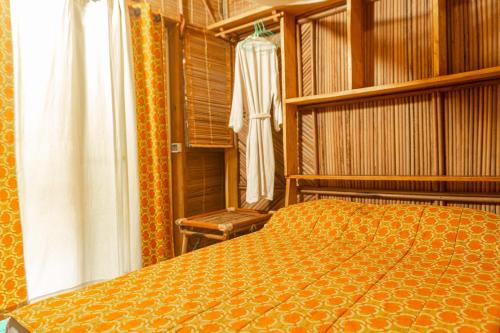 Ένα ή περισσότερα κρεβάτια σε δωμάτιο στο Alafia Lodge