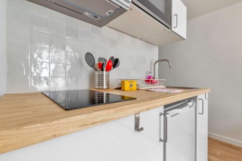 Photo de la galerie de l'établissement Clery-Cosy studio au centre de Paris, à Paris