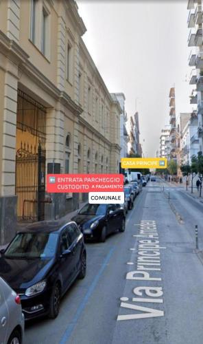 a street with cars parked on the side of the road at Casa Principe Taranto "Intero appartamento" in Taranto