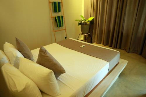 Katil atau katil-katil dalam bilik di Jack & Rose - Hiriketiya, Haven Garden Properties