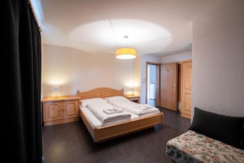 Ένα ή περισσότερα κρεβάτια σε δωμάτιο στο Apartment Edelweiss