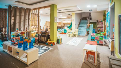 a room filled with lots of play equipment at Malkia Penzion in Orechová Potôň